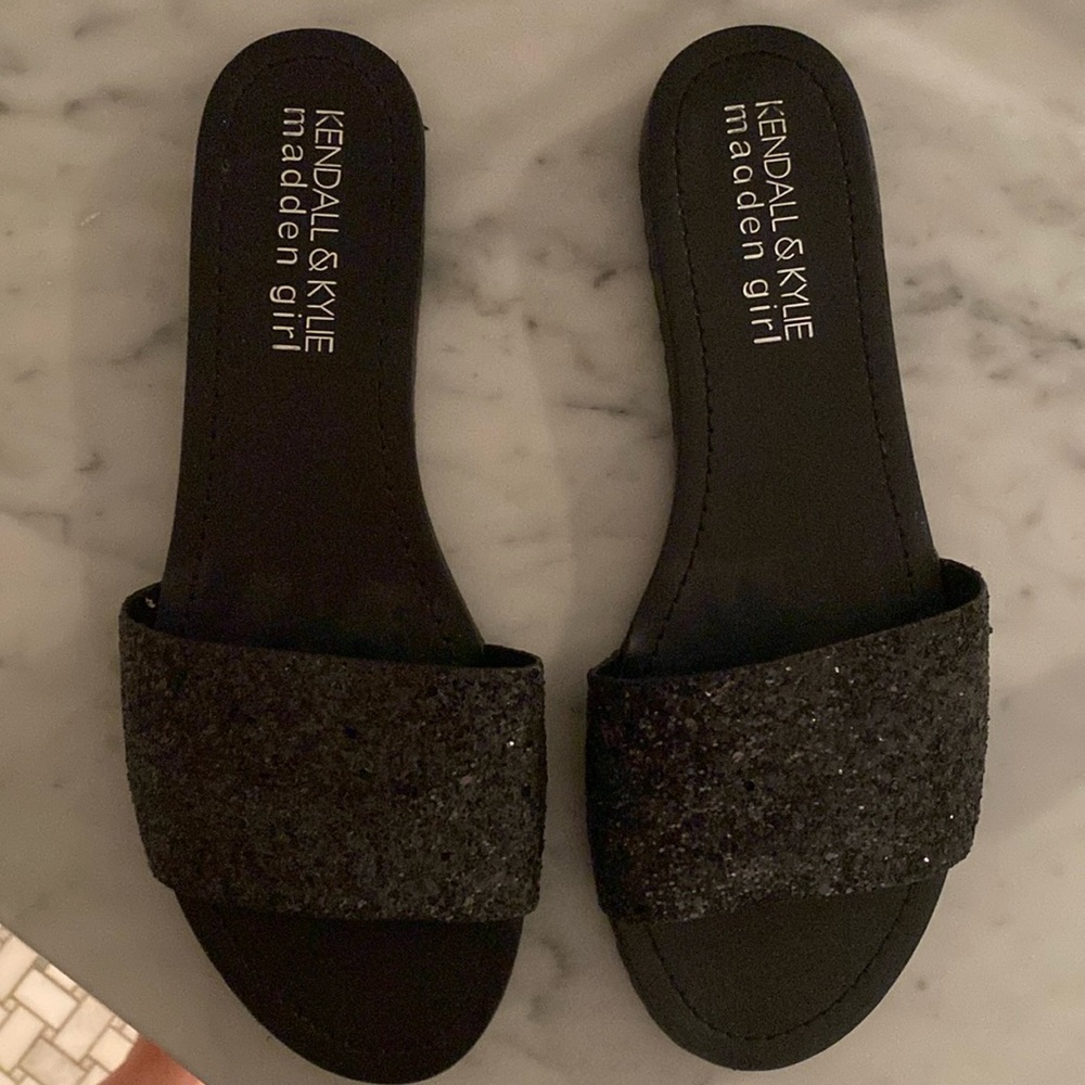 Sparkly black sandals.